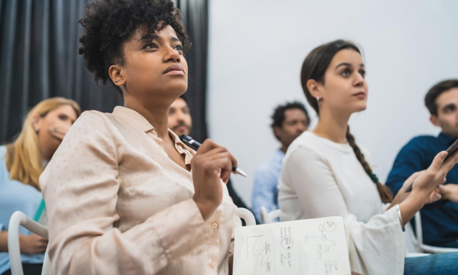 Business professionals engaged in financial analysis training session
